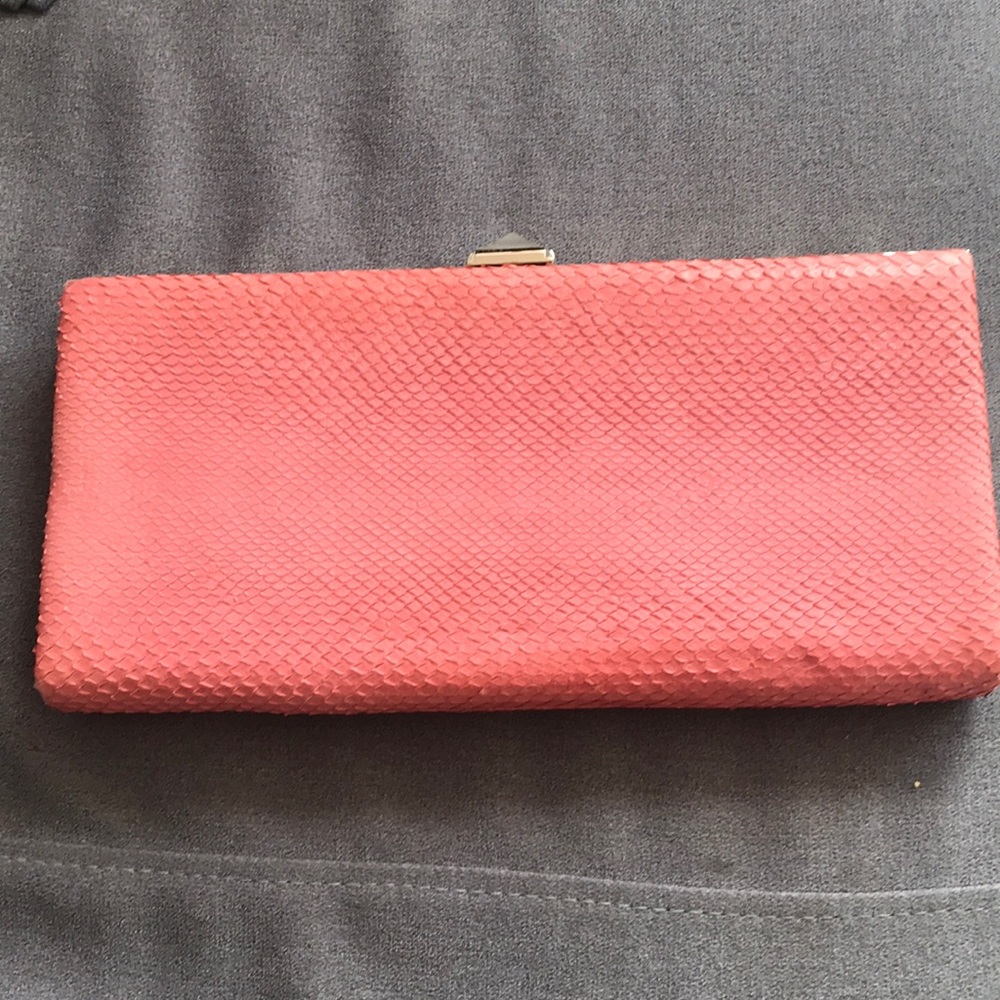 Pink snake clutch
